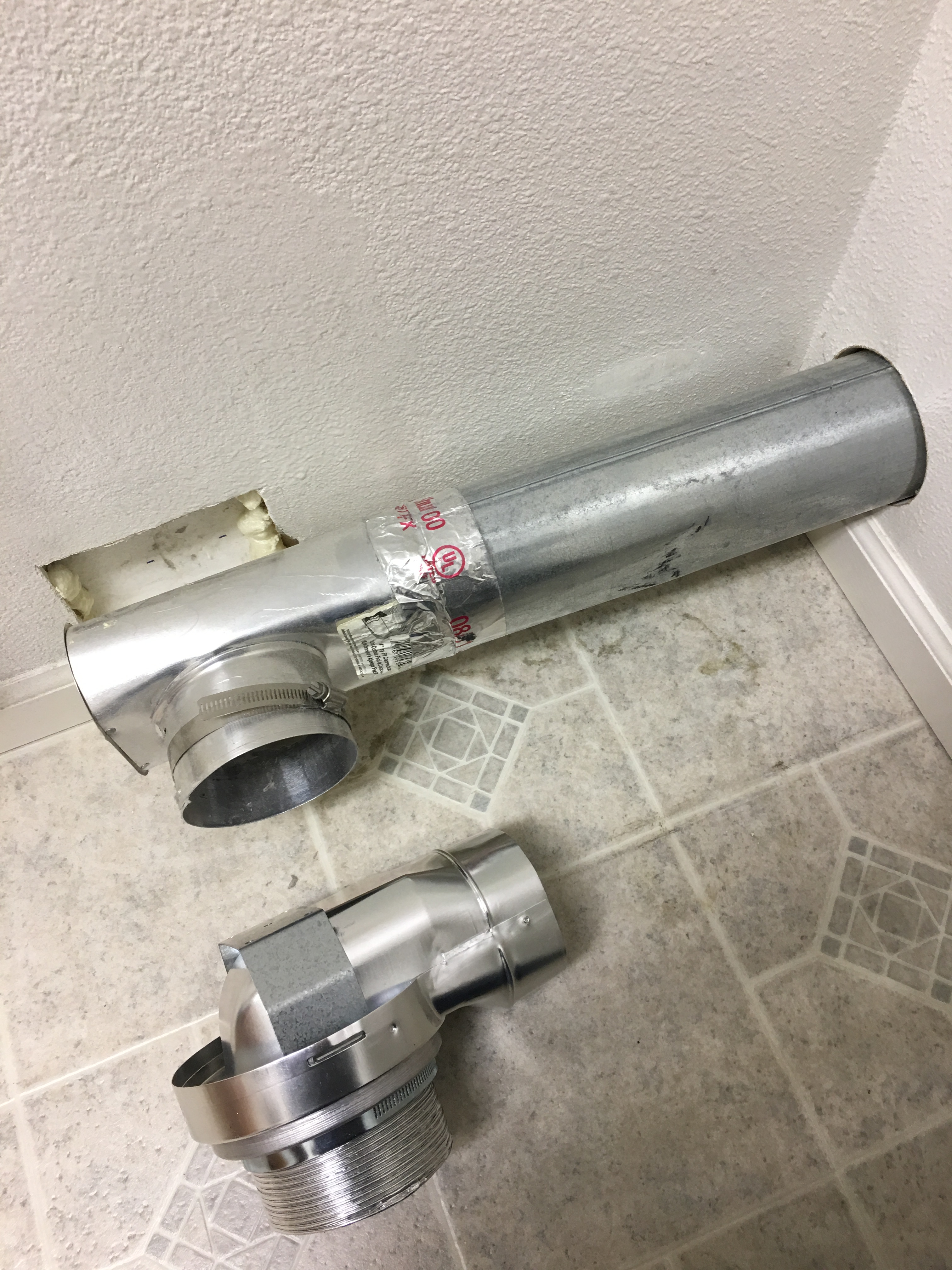 Dryer vent cleanout tee clearance